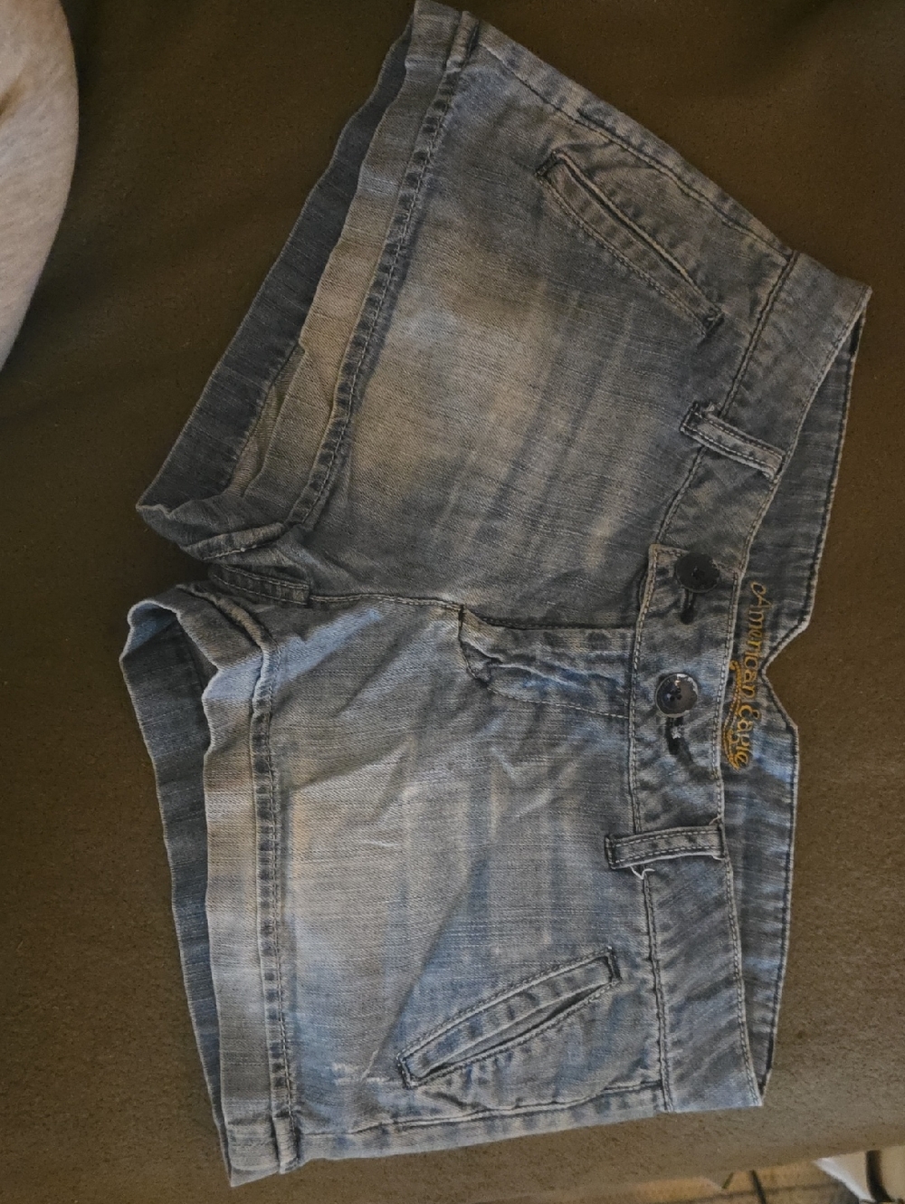 American Eagle Outfitters Light Blue Denim Shorts with Yellow Logo